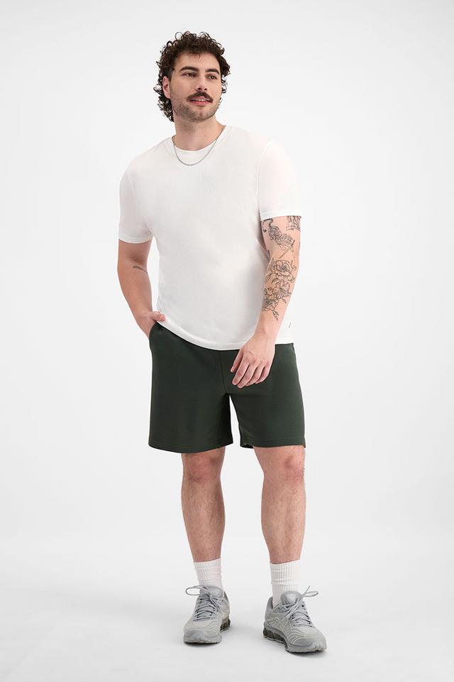 Sam (He/Him) wears size XL and is 178cm tall with 112cm chest