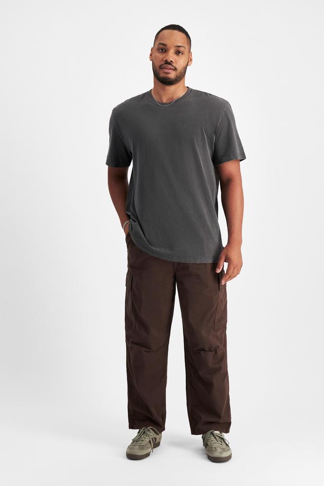 Jason (He/Him) wears size XL and is 194cm tall with 93cm chest and 113cm waist