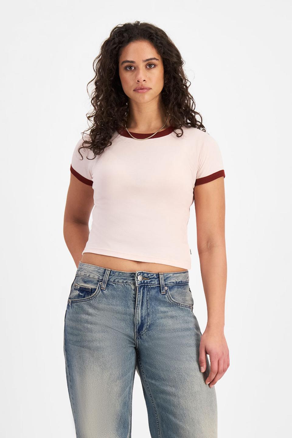 Laila (She/Her) wears size Small and is 180cm tall with 91cm chest and 74cm waist