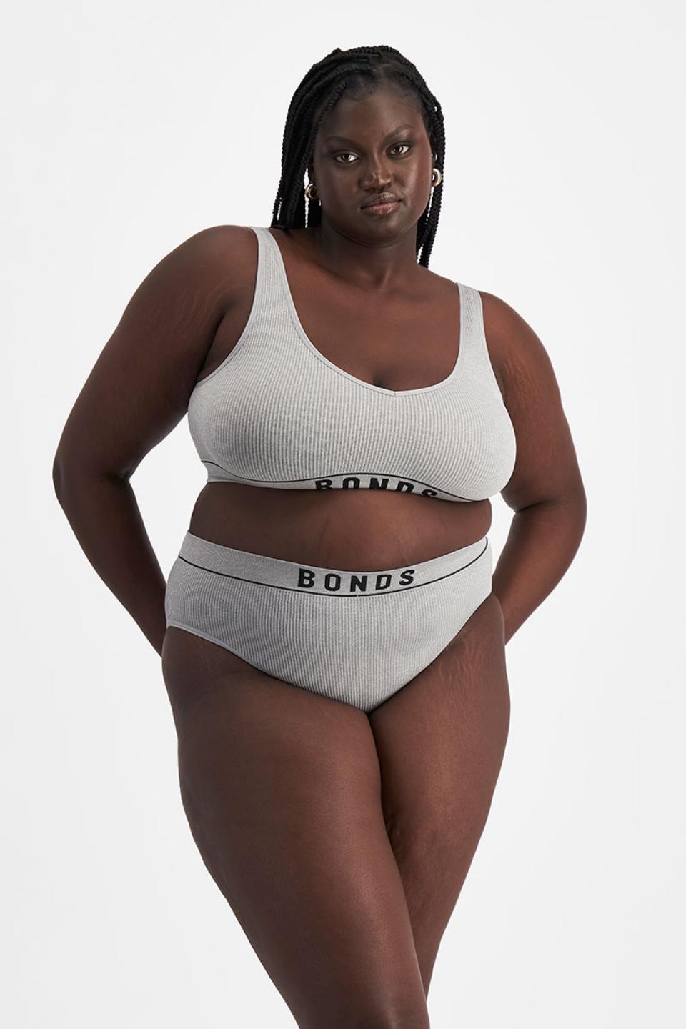Nyapal (She/Her) wears size 20 and is 182cm tall with 121cm chest and 111cm waist