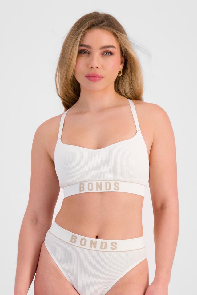 Sienna (She/Her) wears size 12 and is 164cm tall with cm chest and 71cm waist