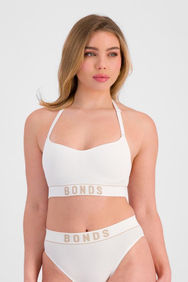 Sienna (She/Her) wears size 12 and is 164cm tall with cm chest and 71cm waist