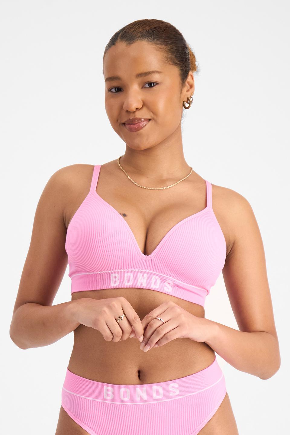 Bibi (She/Her) wears size 12 and is 165cm tall with 83cm chest and 65cm waist