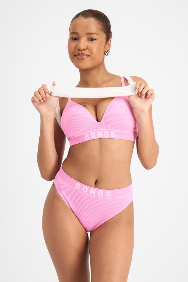 Bibi (She/Her) wears size 12 and is 165cm tall with 83cm chest and 65cm waist