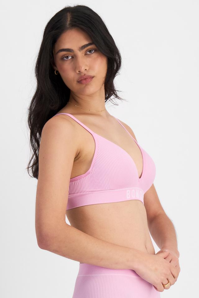 Olivia (She/Her) wears size 12B and is 176cm tall with cm chest and cm waist