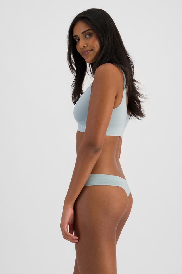NAYA (She/Her) wears size 10 and is 174cm tall with 80cm chest and 63cm waist