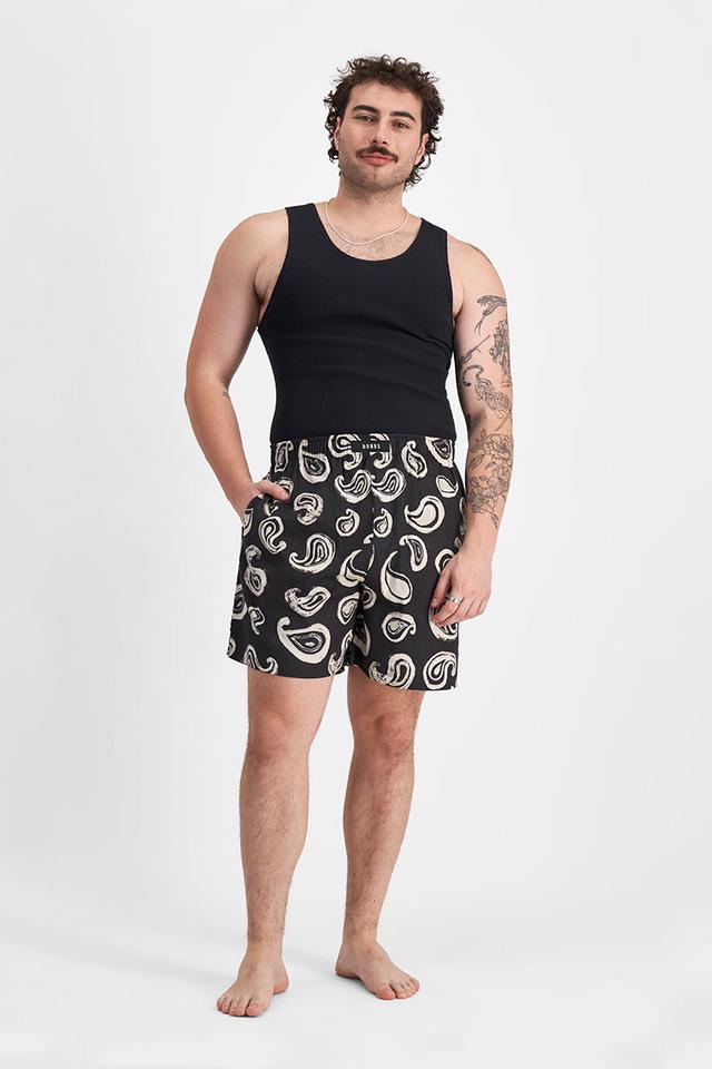 Sam (He/Him) wears size XL and is 178cm tall with 112cm chest
