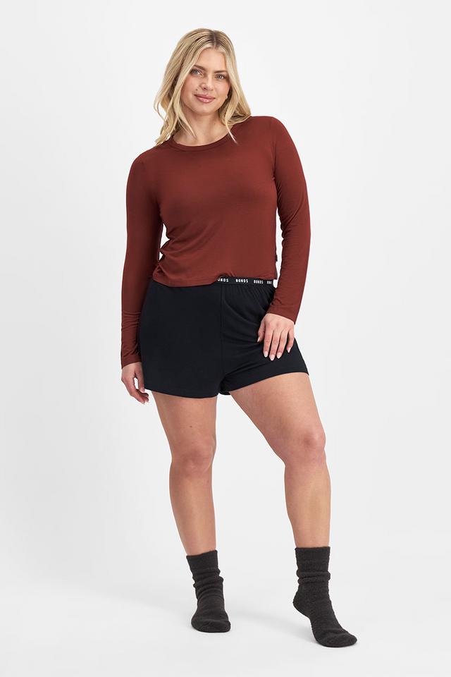 Zoe (She/Her) wears size Large and is 170cm tall with 98cm chest and 85cm waist
