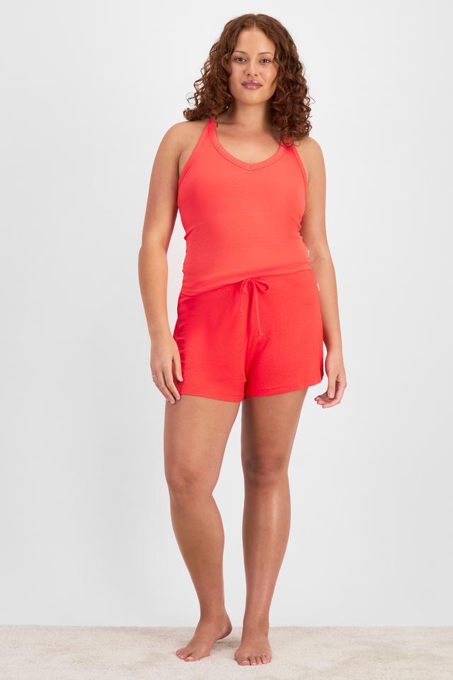 Cameron (She/Her) wears size L and is 179cm tall with 91cm chest and 74cm waist