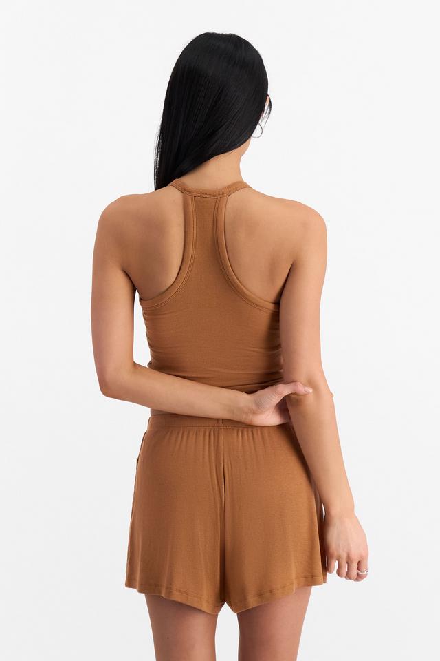 Nancy (She/Her) wears size S and is 170cm tall with 82cm chest and 64cm waist