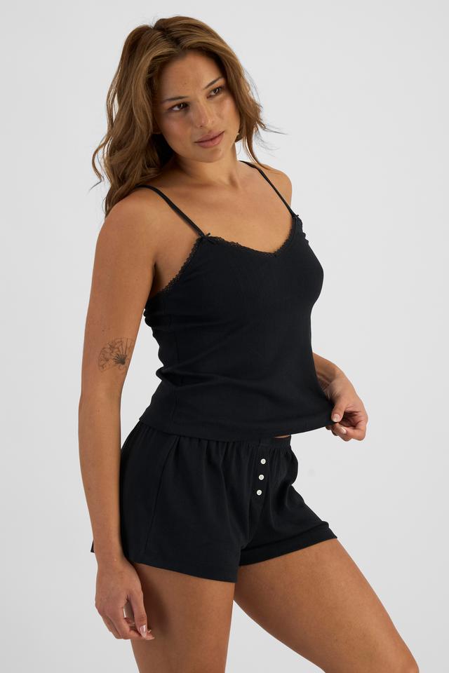 Melissa (She/Her) wears size S and is 169cm tall with 86cm chest and 66cm waist