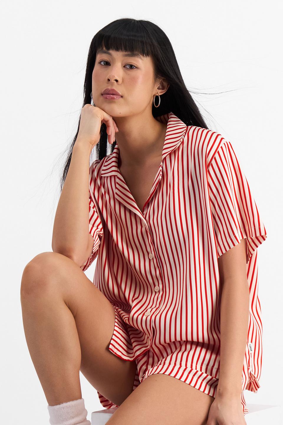 Nancy (She/Her) wears size S and is 170cm tall with 82cm chest and 64cm waist