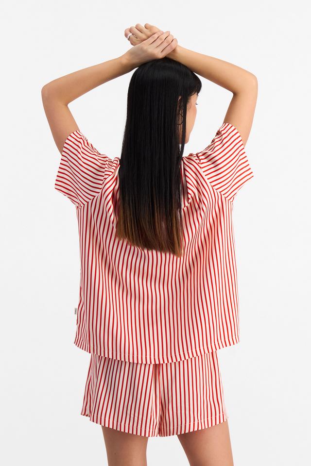 Nancy (She/Her) wears size S and is 170cm tall with 82cm chest and 64cm waist