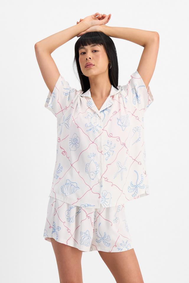 Nancy (She/Her) wears size S and is 170cm tall with 82cm chest and 64cm waist