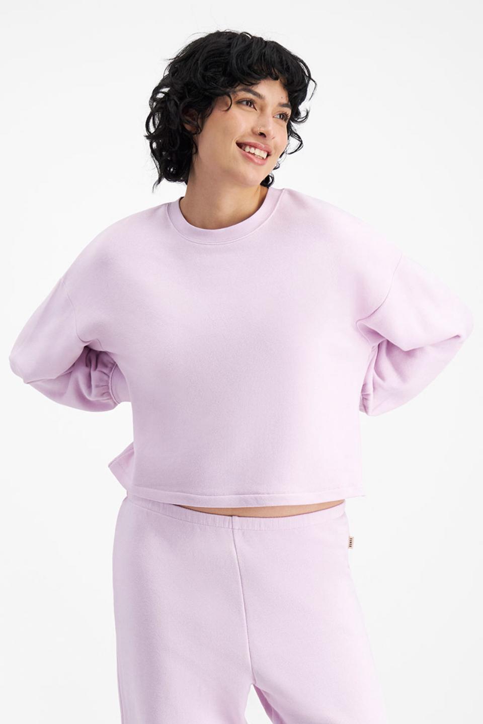 GeeGee (She/Her) wears size Small and is 178cm tall with 96cm chest and 73cm waist