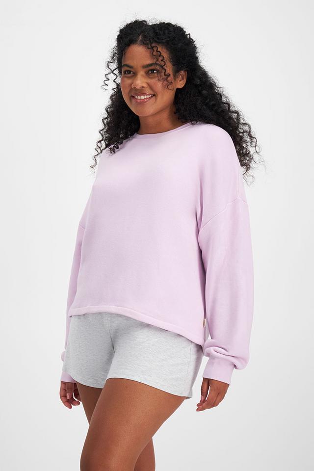 Larissa (She/Her) wears size Large and is 170.18cm tall with 90.17cm chest and 79.756cm waist