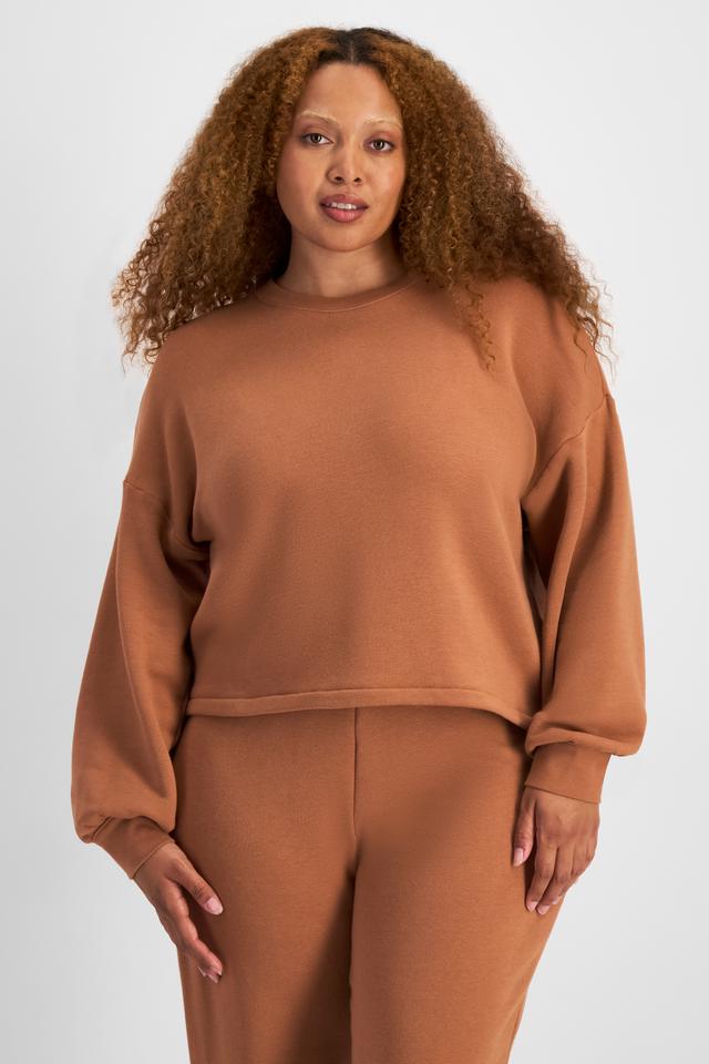 Bailey (She/Her) wears size L and is 168cm tall with 99cm chest and 86cm waist
