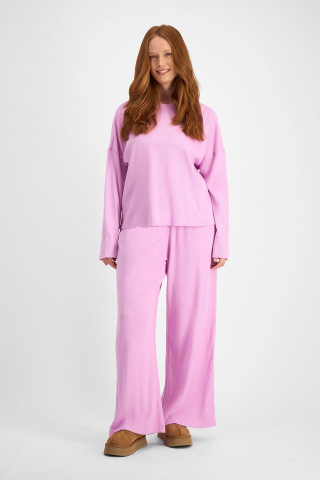 Martine (She/Her) wears size L and is 175cm tall with 82cm chest and 76cm waist