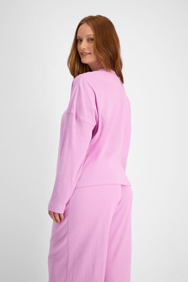 Martine (She/Her) wears size L and is 175cm tall with 82cm chest and 76cm waist