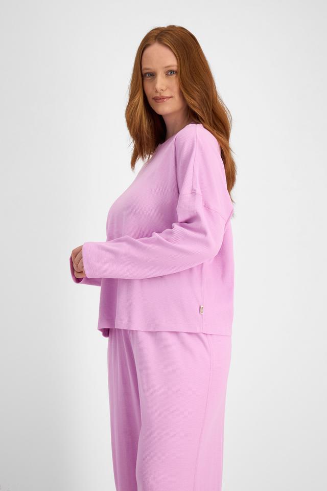 Martine (She/Her) wears size L and is 175cm tall with 82cm chest and 76cm waist