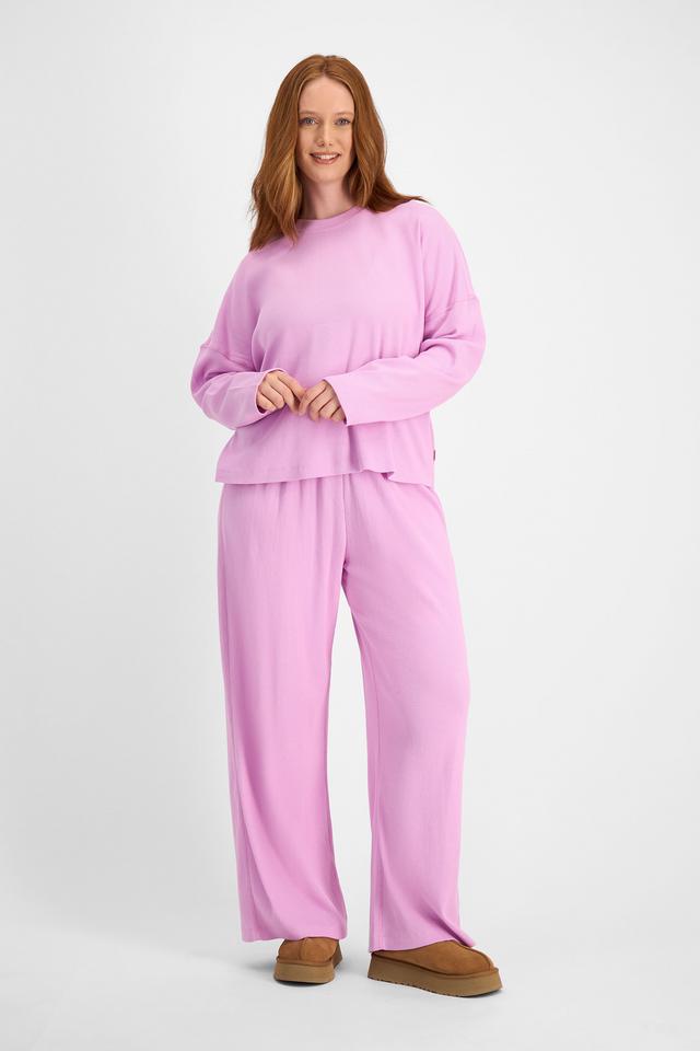 Martine (She/Her) wears size L and is 175cm tall with 82cm chest and 76cm waist