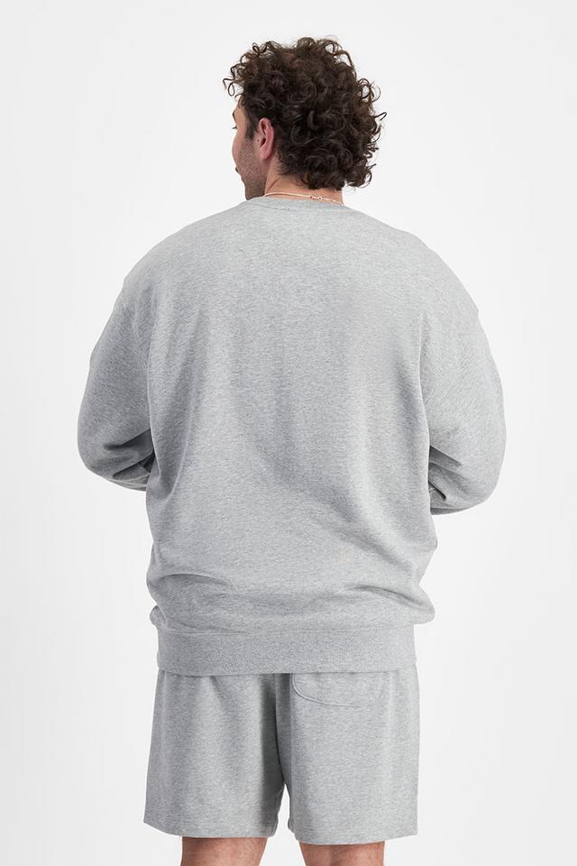Sam (He/Him) wears size XL and is 178cm tall with 112cm chest