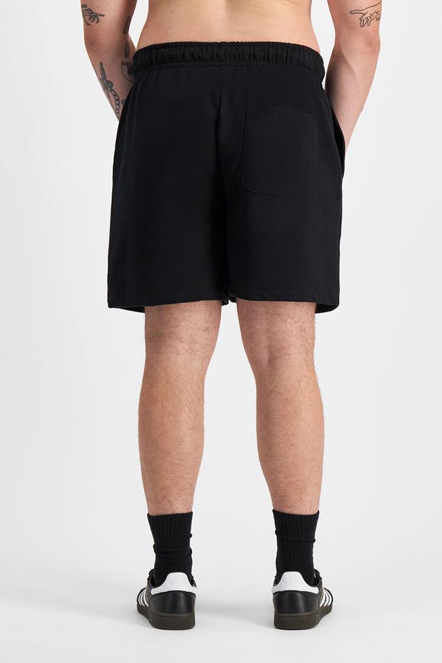 Sam (He/Him) wears size XL and is 178cm tall with 112cm chest