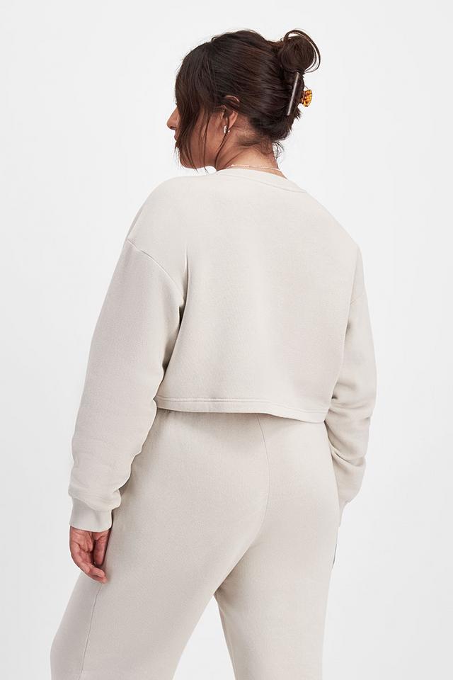 Bella (She/Her) wears size Large and is 173cm tall with 95cm chest and 77cm waist