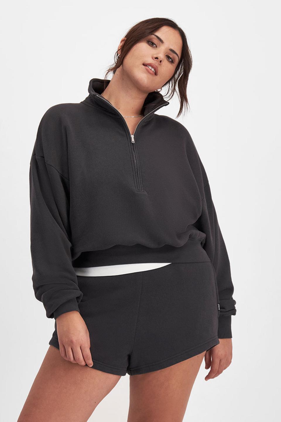 Bella (She/Her) wears size Large and is 173cm tall with 95cm chest and 77cm waist