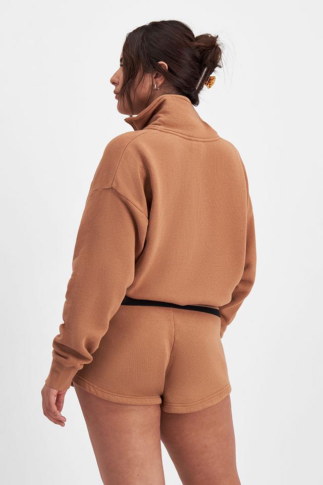 Bella (She/Her) wears size Large and is 173cm tall with 95cm chest and 77cm waist