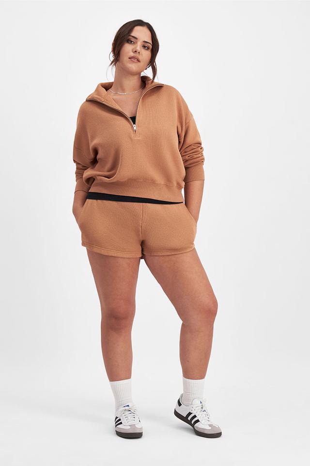 Bella (She/Her) wears size Large and is 173cm tall with 95cm chest and 77cm waist