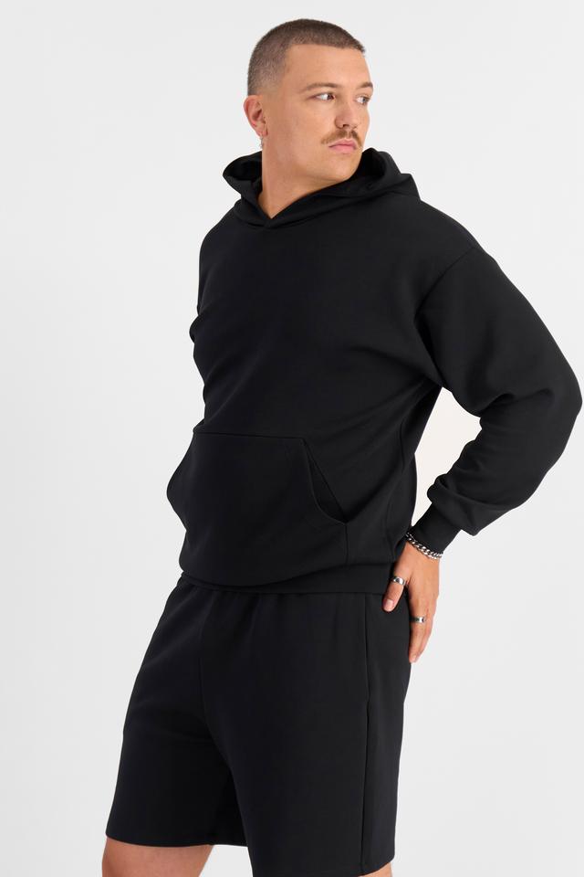 Jake (He/Him) wears size XL and is 195cm tall with 115cm chest and 106cm waist