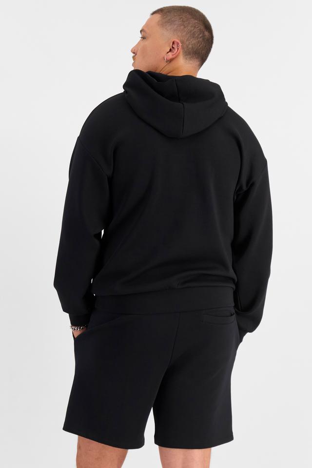Jake (He/Him) wears size XL and is 195cm tall with 115cm chest and 106cm waist