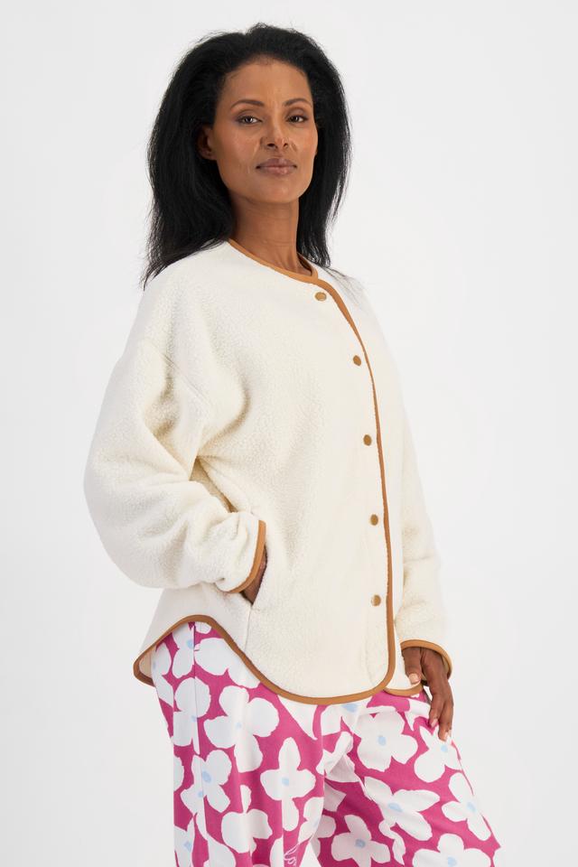 Senait (She/Her) wears size S and is 162cm tall with 79cm chest and 60cm waist