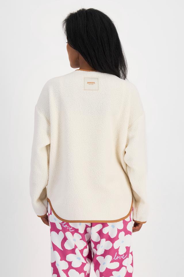 Senait (She/Her) wears size S and is 162cm tall with 79cm chest and 60cm waist