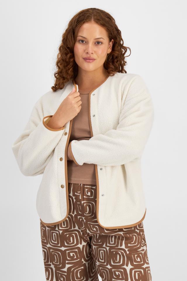 Cameron (She/Her) wears size L and is 179cm tall with 91cm chest and 74cm waist