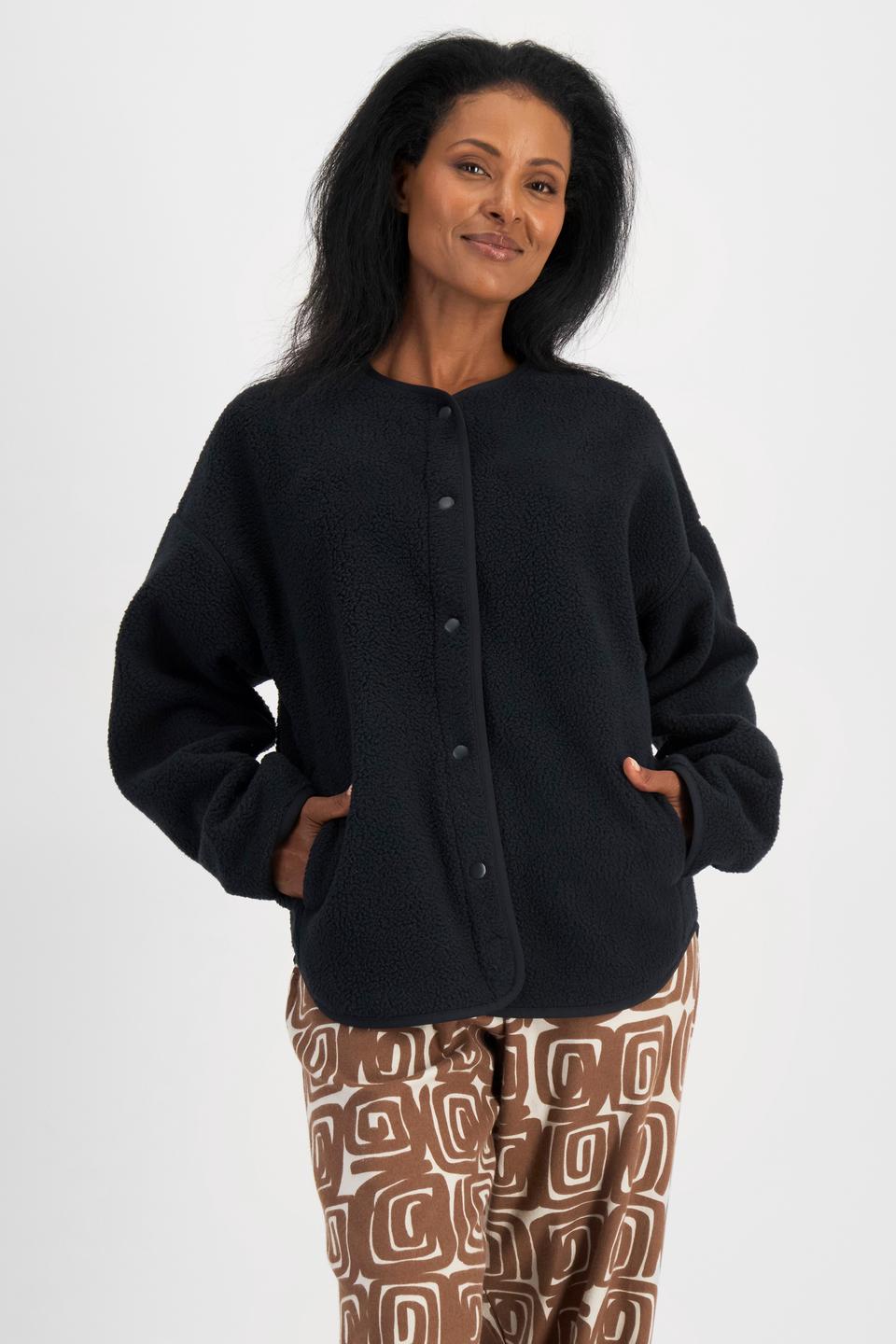 Senait (She/Her) wears size S and is 162cm tall with 79cm chest and 60cm waist