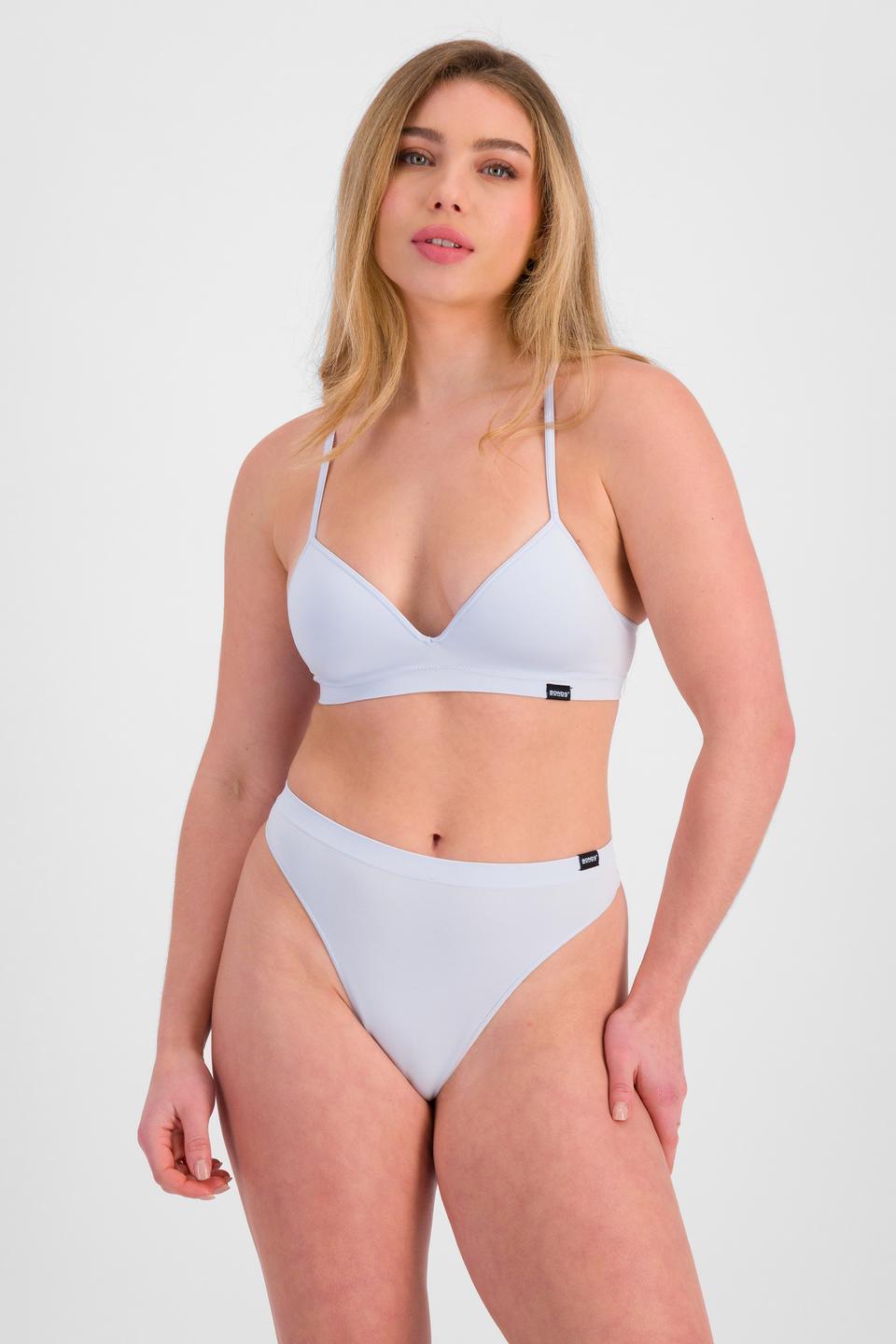 Sienna (She/Her) wears size 10 and is 164cm tall with cm chest and 71cm waist