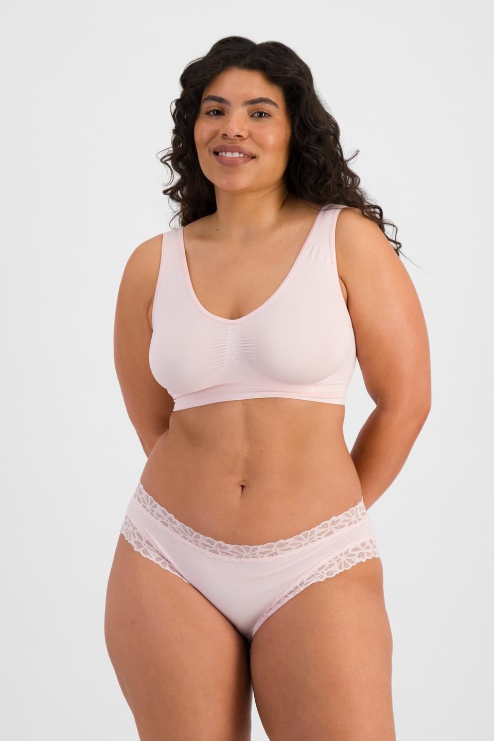 Laura (She/Her) wears size 14 and is 165cm tall with 94cm chest and 76cm waist