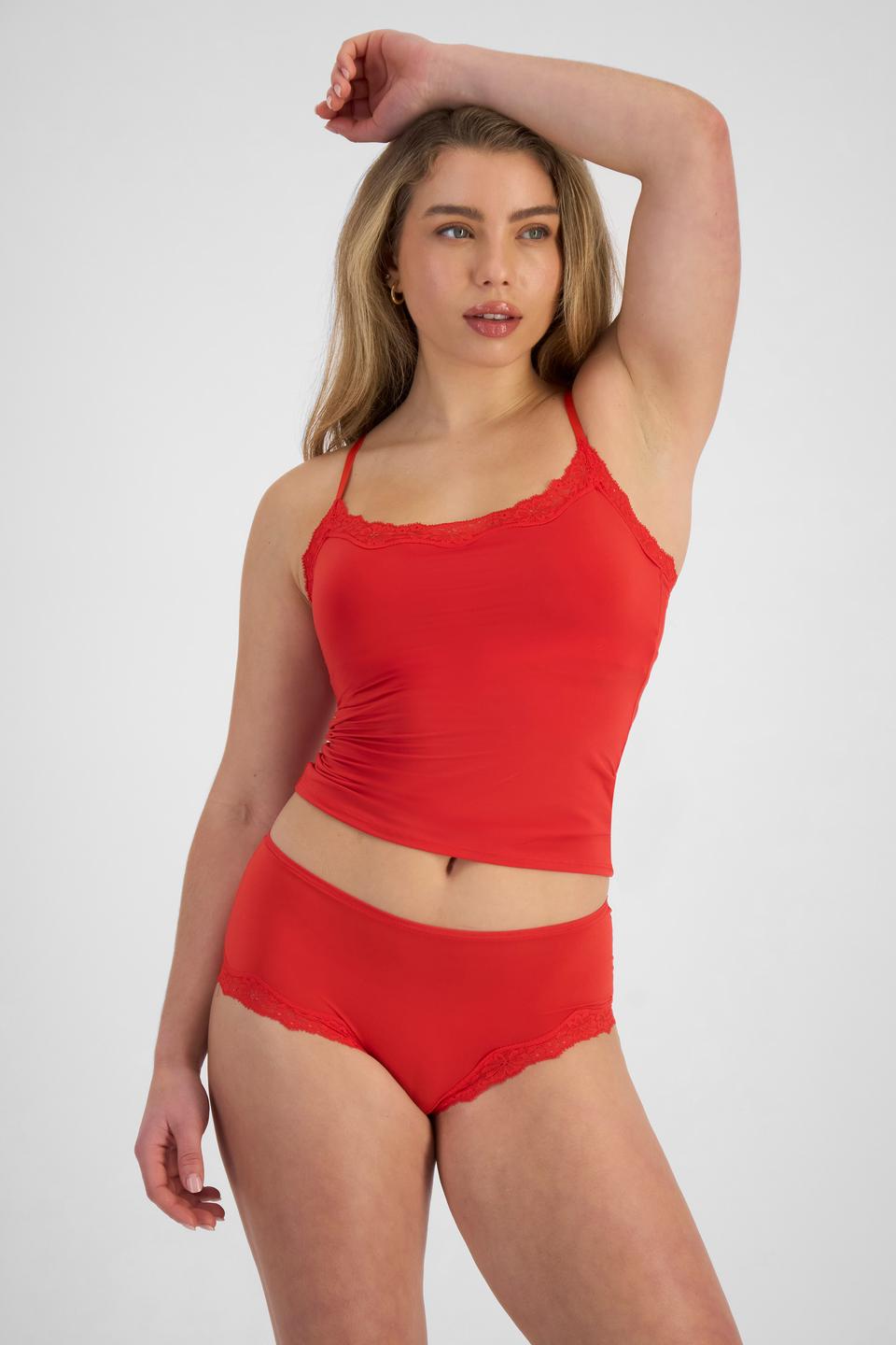 Sienna (She/Her) wears size 12 and is 164cm tall with cm chest and 71cm waist