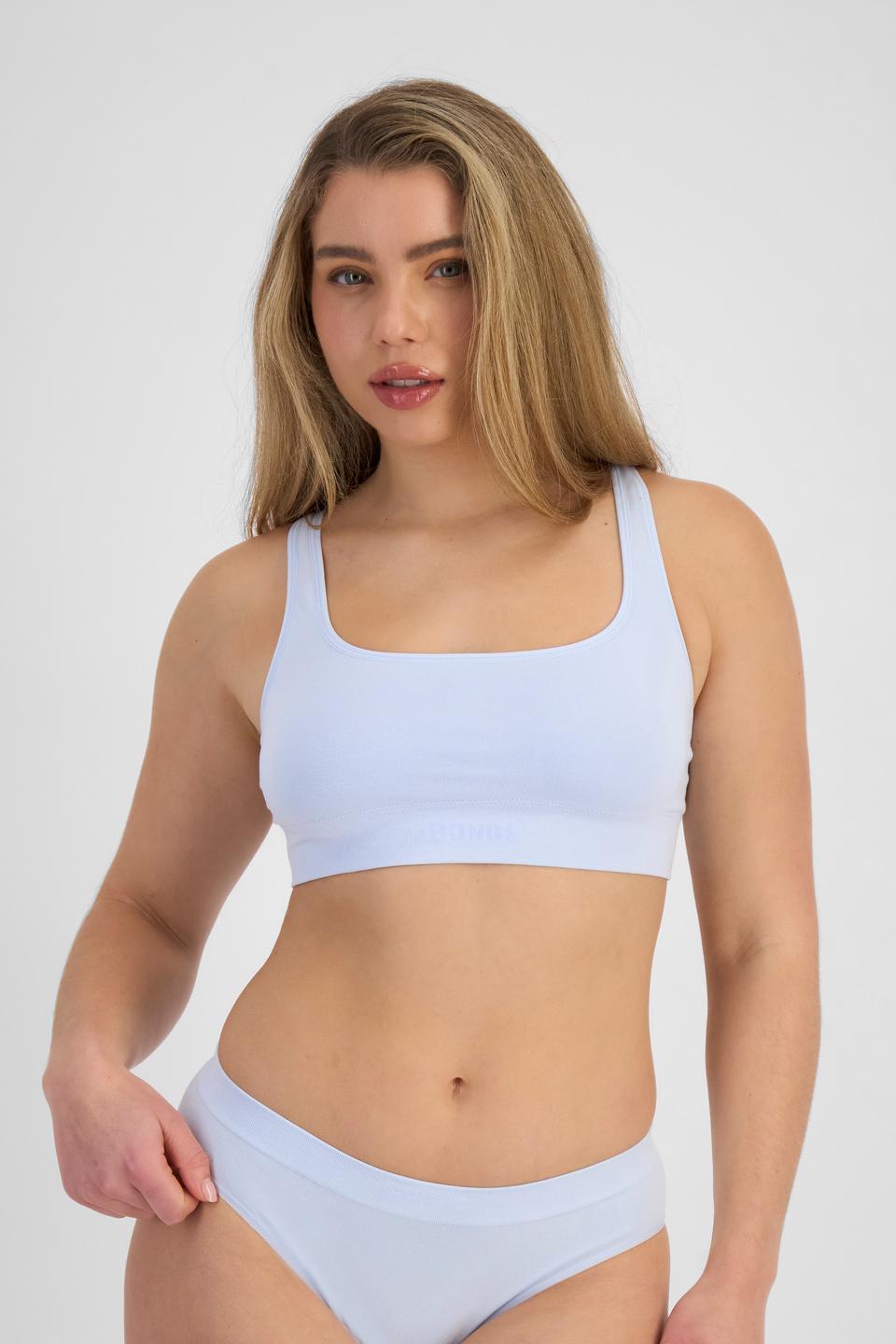 Sienna (She/Her) wears size 12 and is 164cm tall with cm chest and 71cm waist