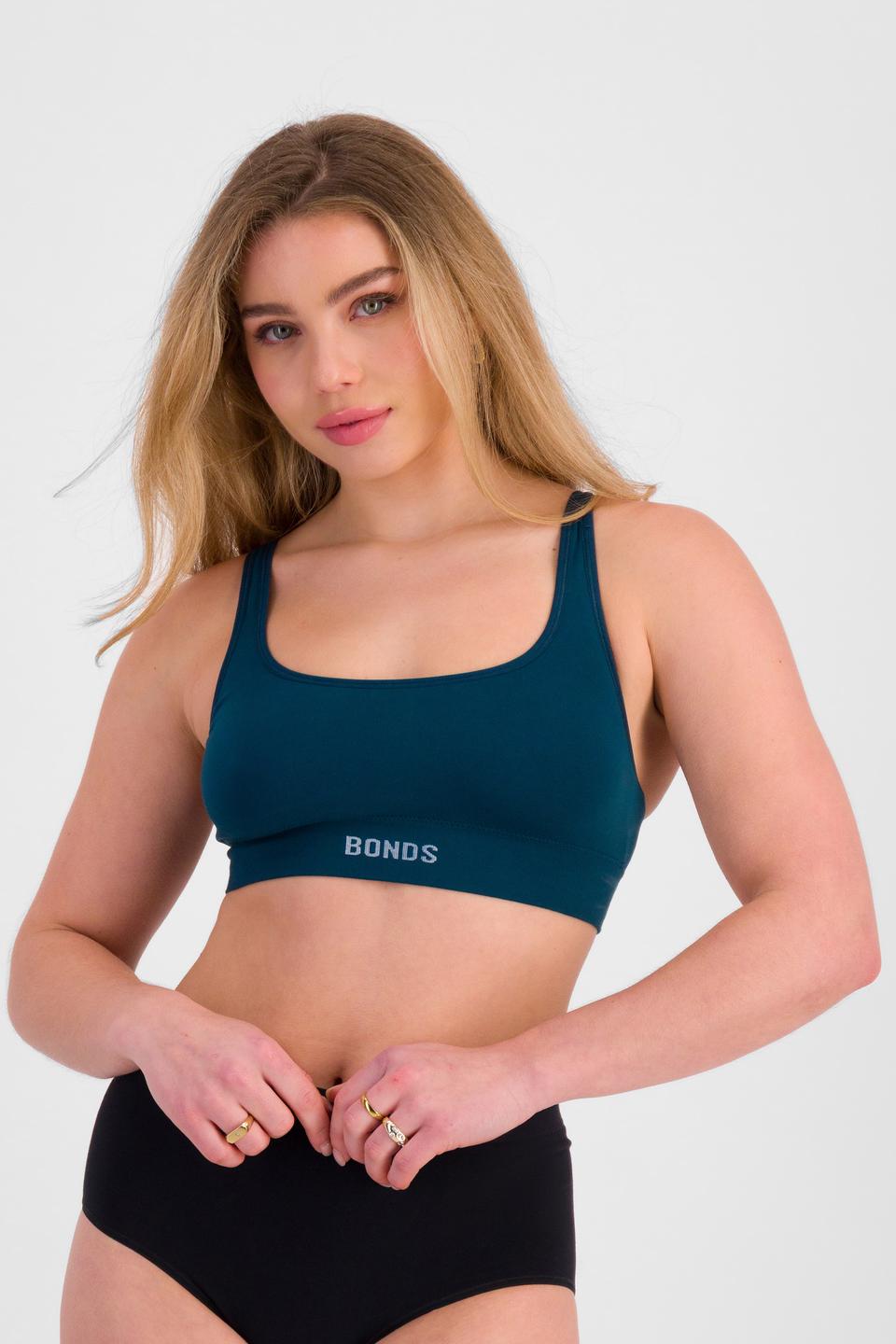 Sienna (She/Her) wears size 12 and is 164cm tall with cm chest and 71cm waist