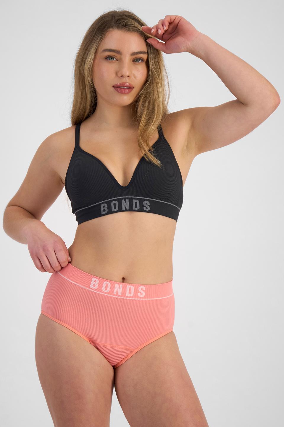 Sienna (She/Her) wears size 10 and is 164cm tall with cm chest and 71cm waist