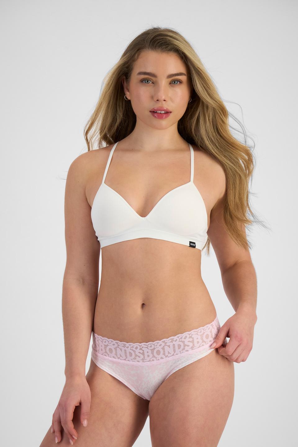 Sienna (She/Her) wears size 10 and is 164cm tall with cm chest and 71cm waist