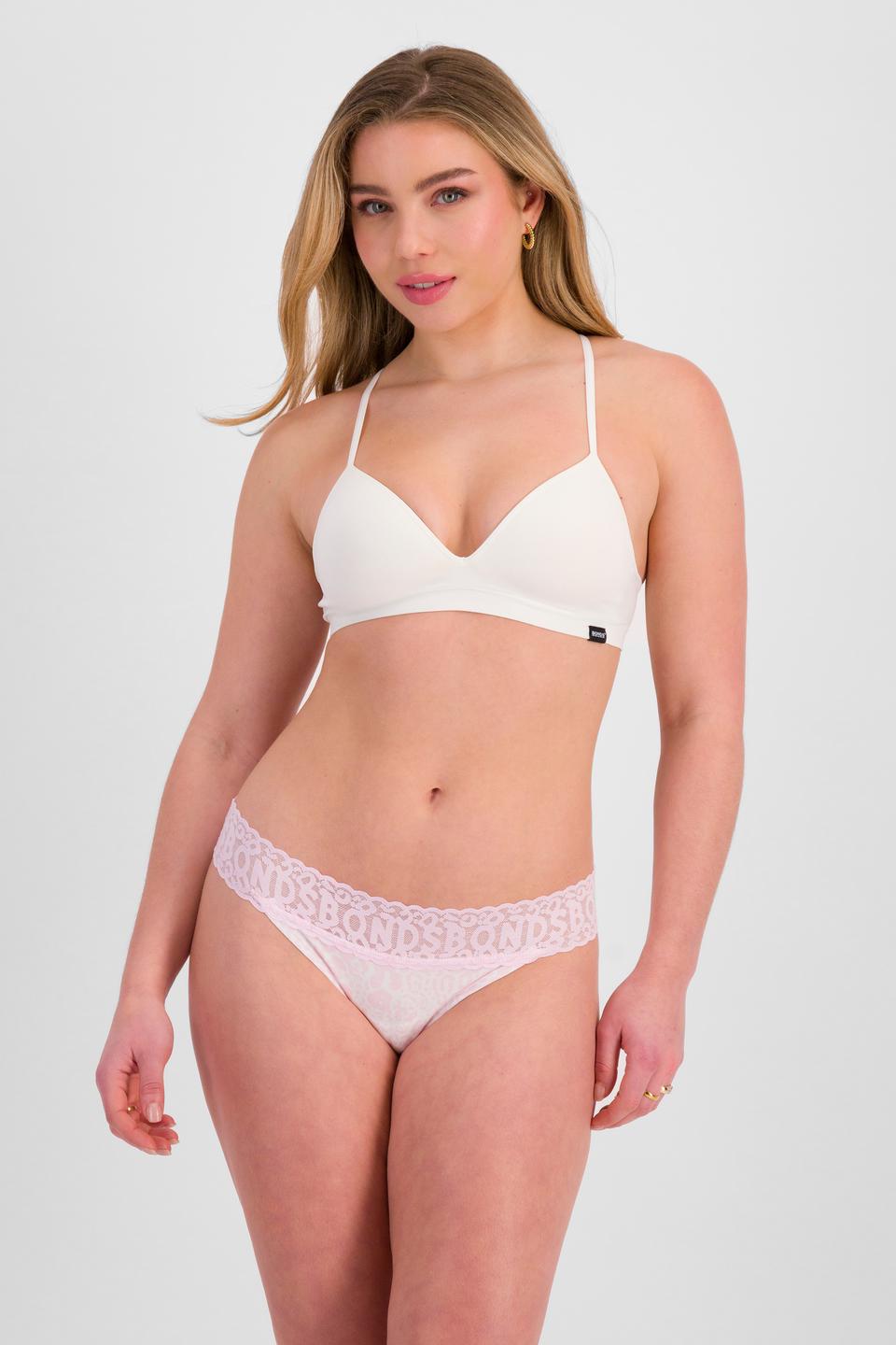 Sienna (She/Her) wears size 10 and is 164cm tall with cm chest and 71cm waist