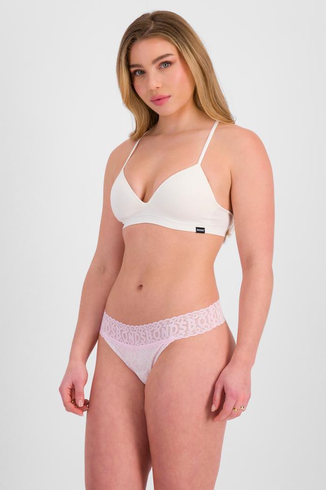 Sienna (She/Her) wears size 10 and is 164cm tall with cm chest and 71cm waist