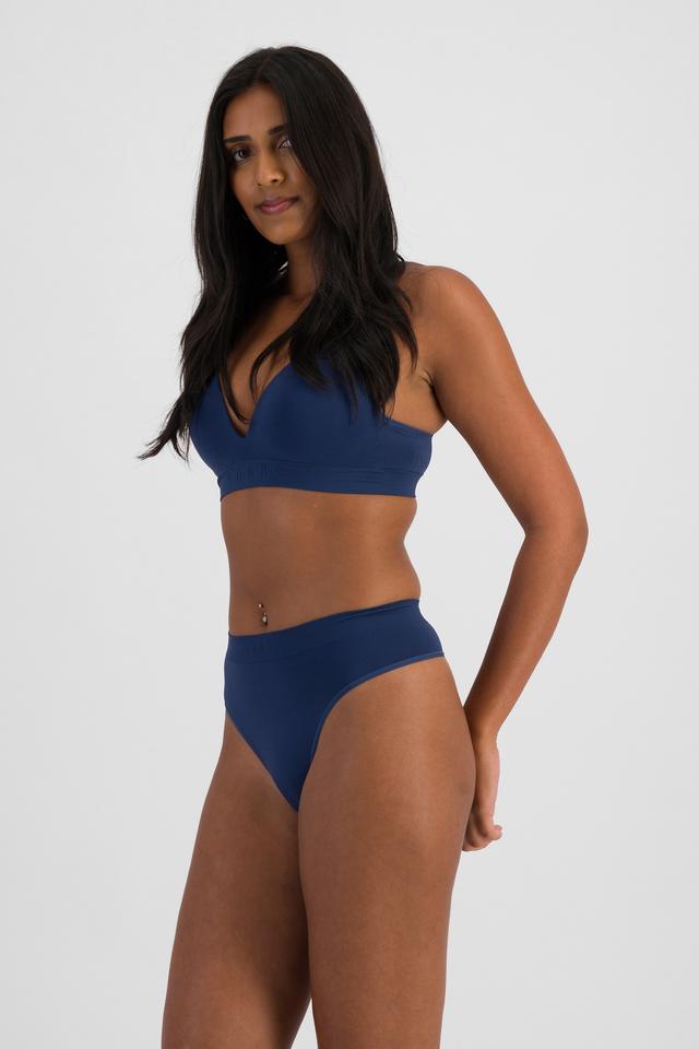 NAYA (She/Her) wears size 10 and is 174cm tall with 80cm chest and 63cm waist