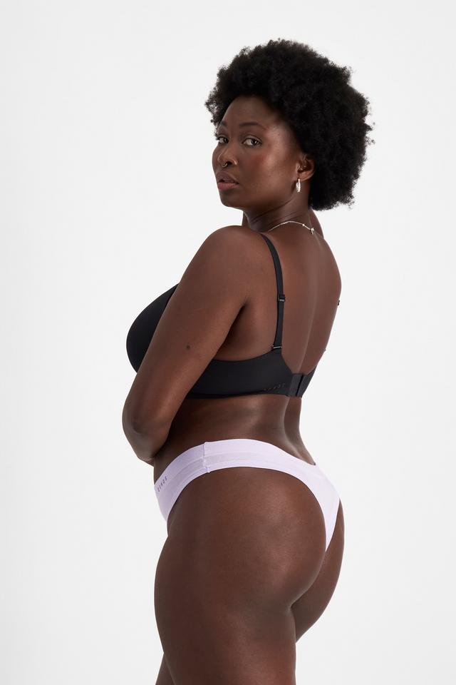 Nelly (She/Her) wears size 14 and is 173.73cm tall with 102cm chest and 84cm waist