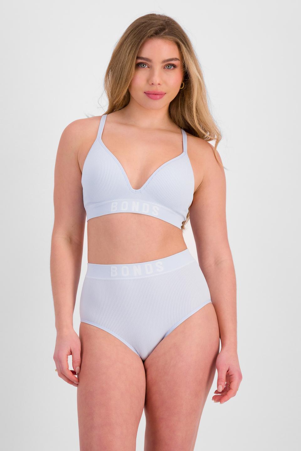 Sienna (She/Her) wears size 10 and is 164cm tall with cm chest and 71cm waist