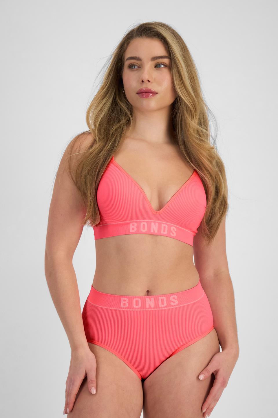 Sienna (She/Her) wears size 10 and is 164cm tall with cm chest and 71cm waist